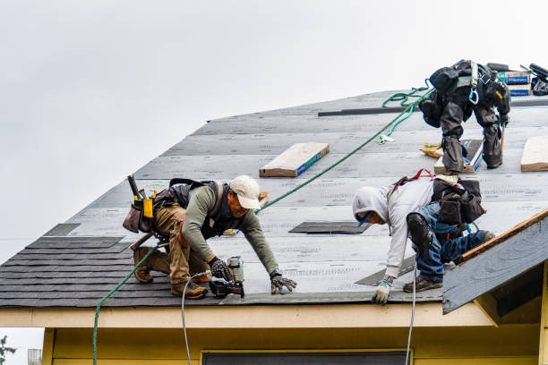 Professional Roofing technician working in New Century, KS